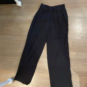 Pantsuit tailored from Florence by an artisan.